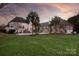 Spacious backyard with lush lawn and stunning pool at 424 Fairhaven Ct, Waxhaw, NC 28173