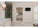 Elegant bathroom with marble vanity, walk-in shower, and soaking tub at 424 Fairhaven Ct, Waxhaw, NC 28173