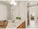 Simple bathroom with single vanity and access to bedroom at 424 Fairhaven Ct, Waxhaw, NC 28173