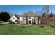 Elegant two-story home with manicured lawn at 424 Fairhaven Ct, Waxhaw, NC 28173