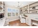 Bright office space with built-in shelving, a lake view, and ample workspace at 424 Fairhaven Ct, Waxhaw, NC 28173