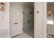 Large walk-in shower with glass enclosure and marble tile at 424 Fairhaven Ct, Waxhaw, NC 28173