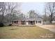 Brick ranch house with a spacious yard and driveway at 4921 Benton Ave, Gastonia, NC 28056