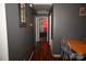 Hallway with wood floors and bedroom view at 4921 Benton Ave, Gastonia, NC 28056