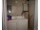 Laundry room with washer, dryer, and water heater at 4921 Benton Ave, Gastonia, NC 28056