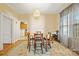 Bright dining room features a table with chairs and access to the kitchen at 625 N 3Rd St, Albemarle, NC 28001