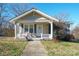 Charming bungalow with a welcoming front porch and well-maintained landscaping at 625 N 3Rd St, Albemarle, NC 28001