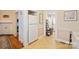 Kitchen area with refrigerator and access to laundry and pantry at 625 N 3Rd St, Albemarle, NC 28001