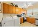 Full view of kitchen with ample cabinetry and appliances at 625 N 3Rd St, Albemarle, NC 28001