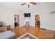 Spacious living area with hardwood floors, fireplace and views to other rooms at 625 N 3Rd St, Albemarle, NC 28001