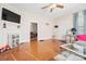 Bright living room with hardwood floors, fireplace and built-in shelving at 625 N 3Rd St, Albemarle, NC 28001