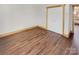 Spacious bedroom with wood flooring and double door closet at 638 Chipley Ave # 6, Charlotte, NC 28205