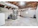 Unfinished basement with exposed ductwork and HVAC system at 6514 Highwood Pl, Charlotte, NC 28210