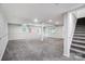 Spacious finished basement with new carpeting, recessed lighting and extra storage at 6514 Highwood Pl, Charlotte, NC 28210