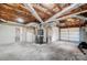 Unfinished basement with garage access and laundry hookups at 6514 Highwood Pl, Charlotte, NC 28210