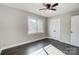 Spacious bedroom with hardwood floors and window at 6514 Highwood Pl, Charlotte, NC 28210