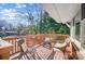 Relaxing outdoor space with wicker chairs and side table at 6514 Highwood Pl, Charlotte, NC 28210