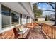 Cozy deck with wicker seating and view of neighborhood at 6514 Highwood Pl, Charlotte, NC 28210