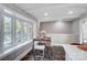 Bright kitchen nook with a table and chairs, and large windows at 6514 Highwood Pl, Charlotte, NC 28210