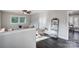 Bright living room with dark hardwood floors and comfy seating at 6514 Highwood Pl, Charlotte, NC 28210