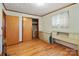 Bedroom with hardwood floors and built-in dresser at 700 Snuggs St, Albemarle, NC 28001
