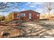 Brick ranch house with driveway and landscaping at 700 Snuggs St, Albemarle, NC 28001