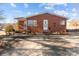 Brick ranch home with a spacious driveway at 700 Snuggs St, Albemarle, NC 28001