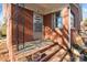 Front entrance with brick steps and ornate railing at 700 Snuggs St, Albemarle, NC 28001