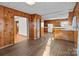 View of kitchen with wood cabinets and flooring at 700 Snuggs St, Albemarle, NC 28001