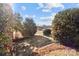 Side yard with bushes and a view of the street at 700 Snuggs St, Albemarle, NC 28001