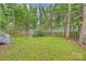 Fenced backyard featuring a shed and open lawn at 741 Mcalway Rd, Charlotte, NC 28211