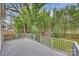 Private backyard with deck and lush bamboo at 741 Mcalway Rd, Charlotte, NC 28211