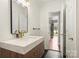 Updated bathroom with a modern vanity and geometric tile floor at 741 Mcalway Rd, Charlotte, NC 28211