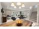 Modern dining room with a view of the living room and kitchen at 741 Mcalway Rd, Charlotte, NC 28211
