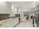 Updated kitchen, featuring white cabinets, granite countertops and stainless steel appliances at 741 Mcalway Rd, Charlotte, NC 28211