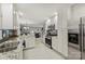 Modern kitchen with white cabinets, granite countertops, and stainless steel appliances at 741 Mcalway Rd, Charlotte, NC 28211