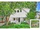 Charming two-story home featuring white siding, brick accents, inviting front porch, and a beautifully landscaped front yard at 741 Mcalway Rd, Charlotte, NC 28211