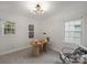 Cozy room with ample sunlight, neutral carpet and white walls perfect for a home office or study at 741 Mcalway Rd, Charlotte, NC 28211