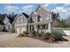 Two-story house with stone accents, two-car garage, and landscaped front yard at 79151 Ridgehaven Rd, Lancaster, SC 29720