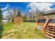 Large backyard with a deck and plenty of green space at 814 Water Wheel Ct, Charlotte, NC 28209