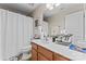 Clean bathroom with single vanity and shower/tub combo at 1007 Rosewater Ln, Indian Trail, NC 28079