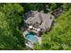 House with pool and patio in a wooded area at 1090 N Saunders Dr, Catawba, NC 28609