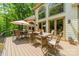 Spacious deck with patio furniture and views of the surrounding woods at 1090 N Saunders Dr, Catawba, NC 28609