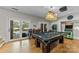 Finished basement with game room, pool table, and large screen projector at 1090 N Saunders Dr, Catawba, NC 28609