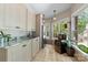 Convenient wet bar with granite countertop and mini-refrigerator at 1090 N Saunders Dr, Catawba, NC 28609