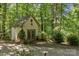 Charming white workshop nestled in woods with double doors at 1090 N Saunders Dr, Catawba, NC 28609