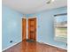 Entryway with light blue walls and hardwood floors at 1219 Burke Rd, Shelby, NC 28152