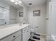 Bathroom with single vanity, shower/tub combo, and neutral decor at 1414 Kings Grove Dr, York, SC 29745