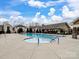 Community pool with a separate kiddie pool and covered seating at 1414 Kings Grove Dr, York, SC 29745