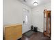 Bright entryway with hardwood floors, a coat rack, and a grandfather clock at 1414 Kings Grove Dr, York, SC 29745